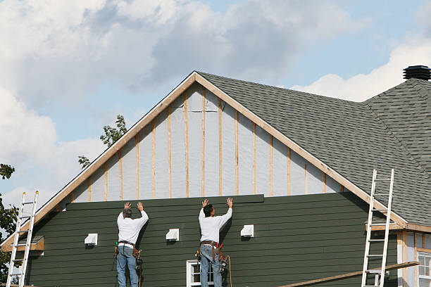 Professional Emergency Siding Repair technician working in Louisburg, NC